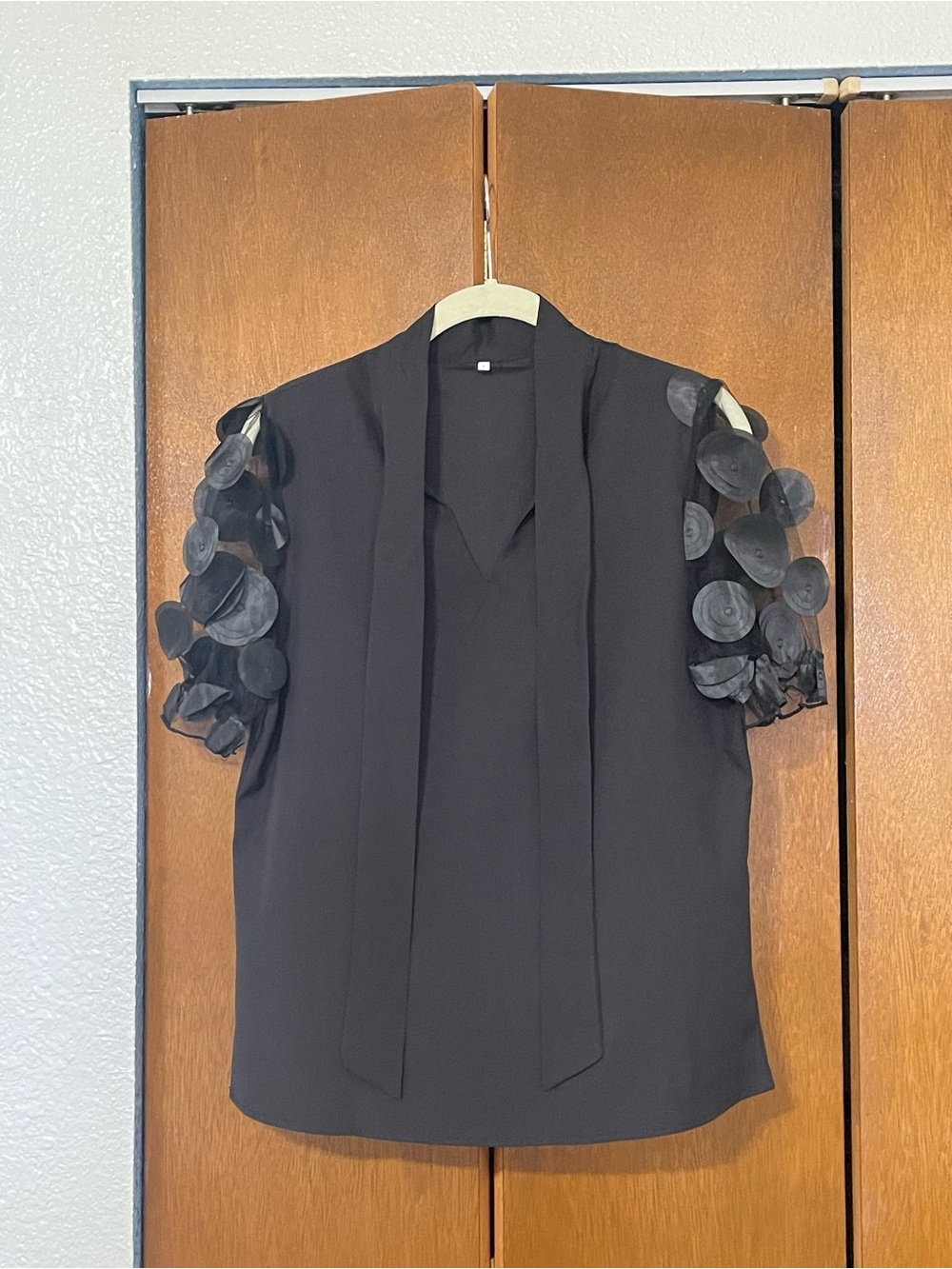 Black Bow-Neck Short Sleeve Blouse with Decorative Sheer Disc Sleeves